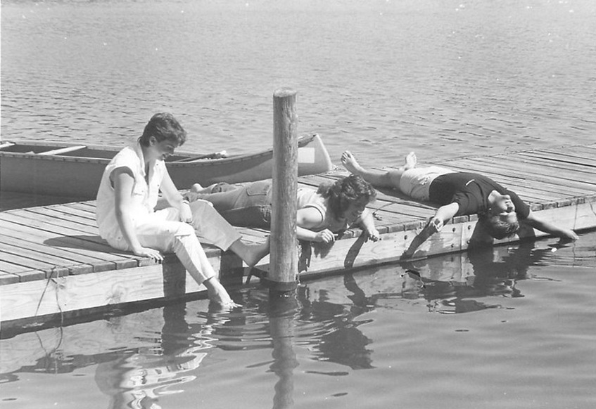 Vintage photo of students lounging at Paris Lake dock